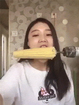how-to-eat-corn-and-get-a-haircut.gif