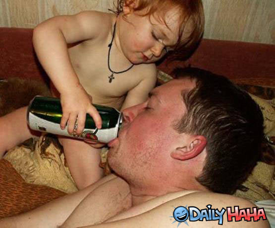Baby feeds dad