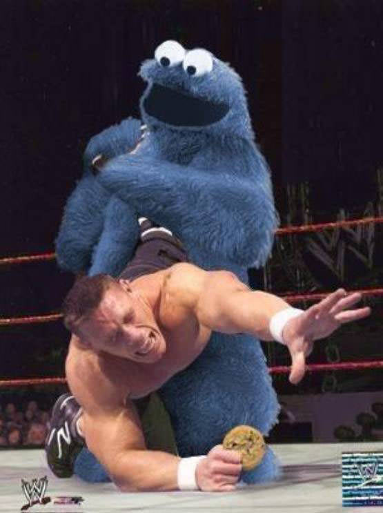 When pro wrestling began to suck... - Page 6 Cookie_monster_wrestling.jpg