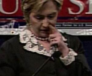 Hillary picking her nose