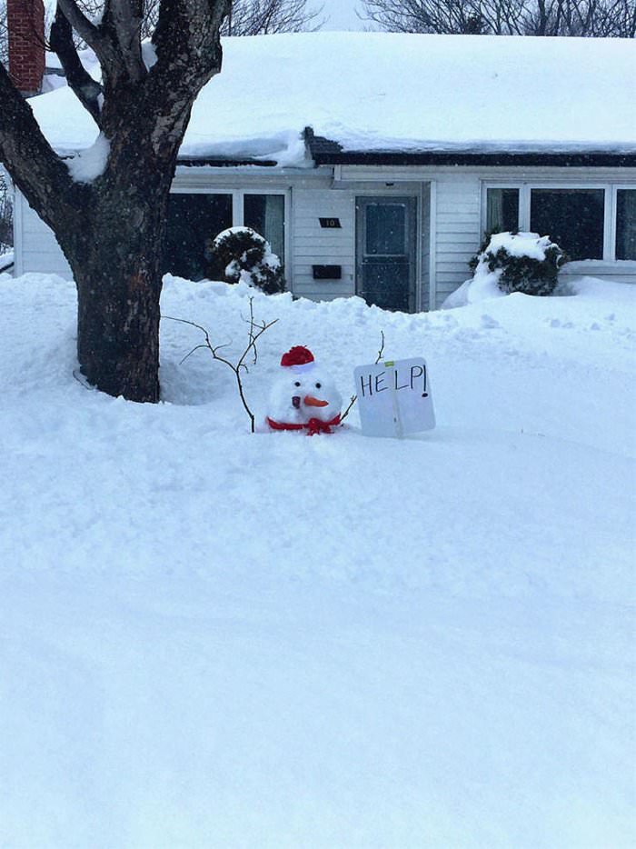 the snowman needs help