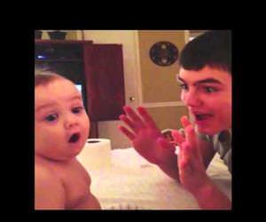 baby is amazed by simple magic trick Funny Video