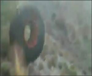 Giant Tire down Hill Funny Video