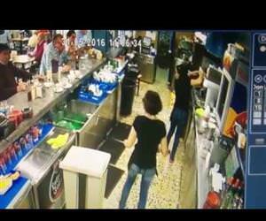waitress karate kicks mug to save it Funny Video