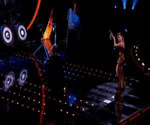 Nicole Scherzinger scoring a bullseye
