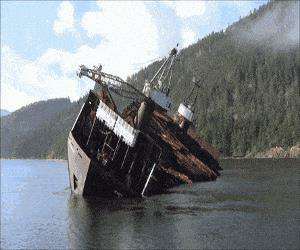 log barge dumps it
