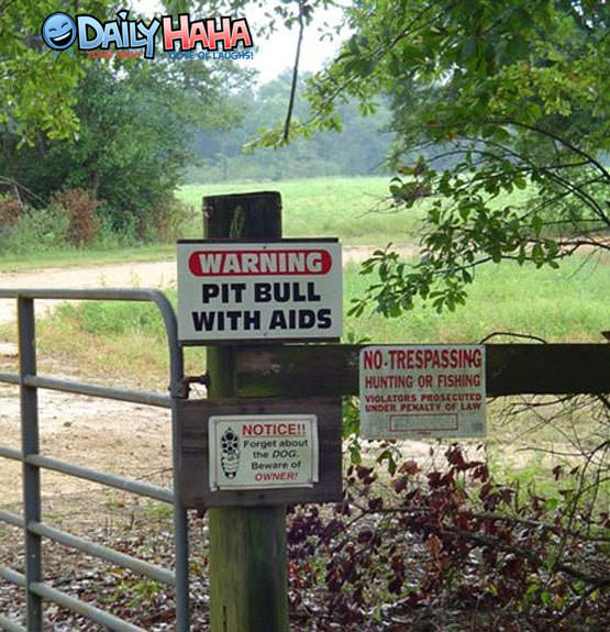Pit Bull with AIDS sign