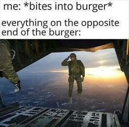bites into burger