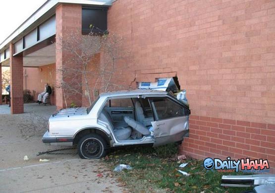 Car Crash into Brick Wall