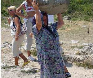 Grandma Carrying Rocks
