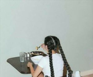 her hair is so long she needs a bag