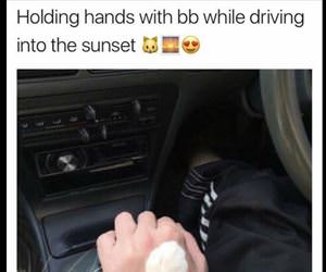 holding hands with baby