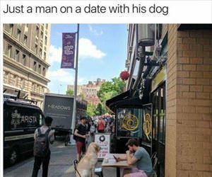 man on a date with his dog