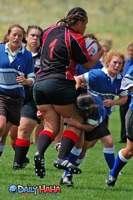 Large woman playing Rugby