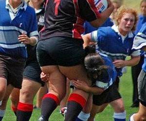 Large woman playing Rugby
