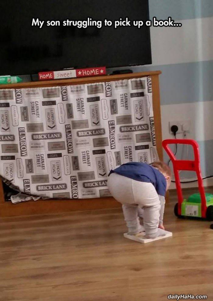 picking up a book funny picture
