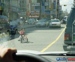 Tricycle in Traffic funny picture