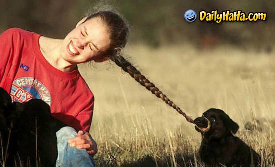 Puppy pulling her hair