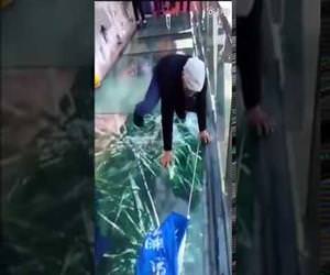 Tourists terrified of cracking glass bridge prank Funny Video