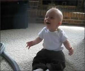 Baby laughing at the Vacuum