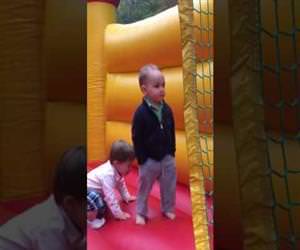 coolest 2 year old ever in a bounce house