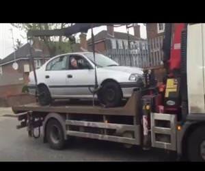 drives his car off tow truck Funny Video