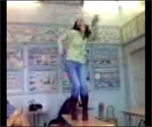 Girl wipes out on Desk