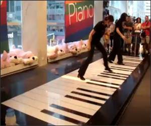 Girl plays giant piano Funny Video