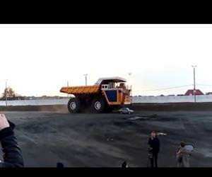 huge dump truck vs car Funny Video