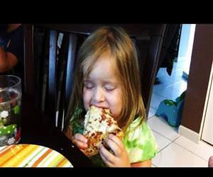 little girl falls asleep eating pizza Funny Video