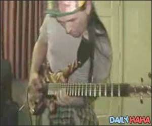 Super fast guitarist video.